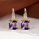 Gold Hoop Earrings with Mysterious Stones