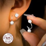 Double Spiral Earrings with Brilliant Zirconia