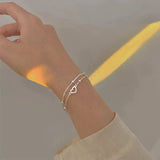 Adjustable bracelet with heart in silver