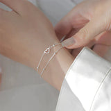Adjustable bracelet with heart in silver