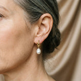 Elegant Earrings with Baroque Pearls in Gold