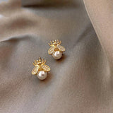Pearl and Zirconia Earrings in Gold