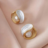 Luxury earrings with white opal and pearls in gold