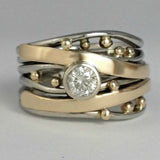 Vintage ring with zirconia inlays and gold