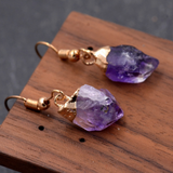 Gold earrings with amethyst