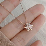 Crystal Necklace with Shimmering Snowflake in Gold and Silver