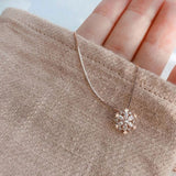 Crystal Necklace with Shimmering Snowflake in Gold and Silver