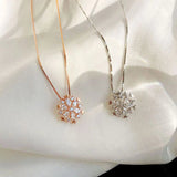 Crystal Necklace with Shimmering Snowflake in Gold and Silver