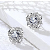 Spiral Flower Cross Earrings