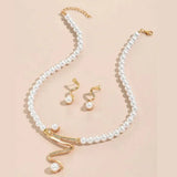 Set of Natural Pearl Necklace and Earrings