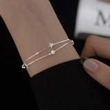 Elegant silver bracelet with charming stars