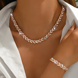Elegant Fish Tail Set with Glass and Gemstones