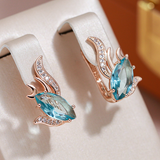 Elegant Earrings with Turquoise Crystals in Gold