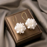 Elegant Earrings with White Flowers