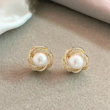Elegant Gold Earrings with Spiral Pearls and Zirconias