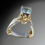 Vintage ring in gold and silver with blue zirconia