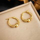 Hoop earrings with gold beads