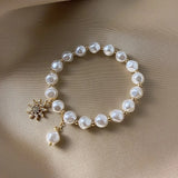 Bracelet with White Gold Charm, Pearl and Sunflower