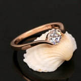Vintage rose gold ring with solitaire and round diamonds