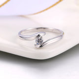 Curved Band Ring in Silver with Brilliant Diamond in the Centre