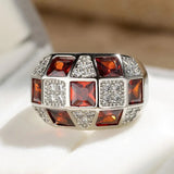 Vintage ring in silver and red gemstones
