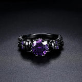 Vintage Black Round Ring with Purple Gemstone and Intricate Design